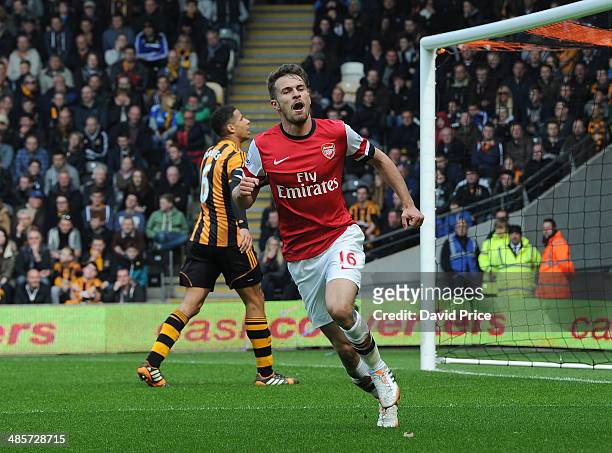 Aaron Ramsey celebrates scoring a goal for Arsenal during the match between Hull City and Arsenal in the Barclays Premier League at KC Stadium on...