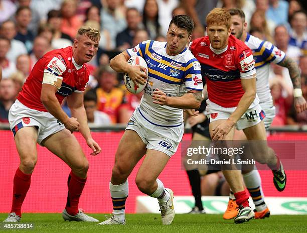 Tom Briscoe of Leeds Rhinos pushes through Hull KR during the Ladbrokes Challenge Cup Final between Leeds Rhinos and Hull KR at Wembley Stadium on...