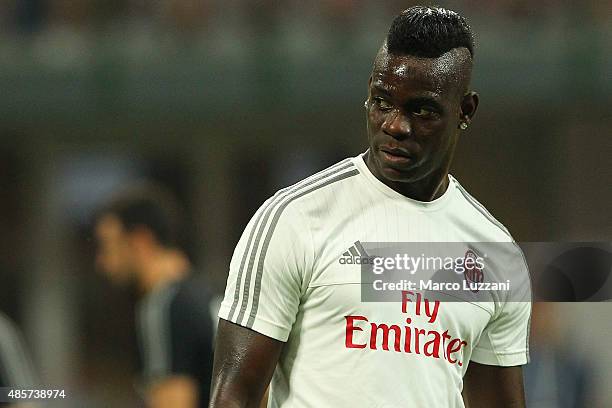 Mario Balotelli of AC Milan looks on before the Serie A match between AC Milan and Empoli FC at Stadio Giuseppe Meazza on August 29, 2015 in Milan,...