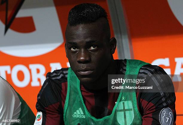 Mario Balotelli of AC Milan looks on before the Serie A match between AC Milan and Empoli FC at Stadio Giuseppe Meazza on August 29, 2015 in Milan,...