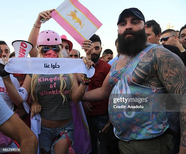 Lebanese model Myriam Klink takes part in a rally at the Martyrs' Square to protest the ongoing garbage crisis and alleged government corruption on...