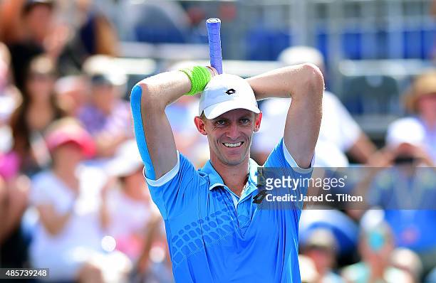 Kevin Anderson of South Africa celebrates after defeating Pierre-Hugues Herbert of France during the men's final match of the Winston-Salem Open at...