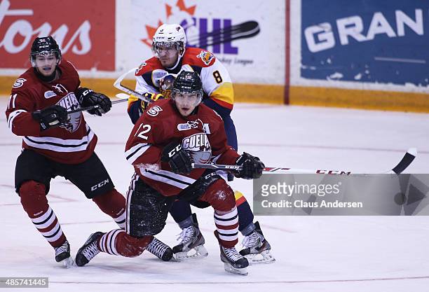 Joel Wigle of the Erie Otters skates against Ryan Horvat of the Guelph Storm in Game Two of the OHL Western Conference Final at the Sleeman Centre on...