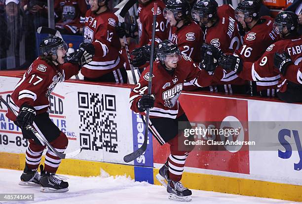 Scott Kosmachuk of the Guelph Storm celebrates a goal against the Erie Otters in Game Two of the OHL Western Conference Final at the Sleeman Centre...