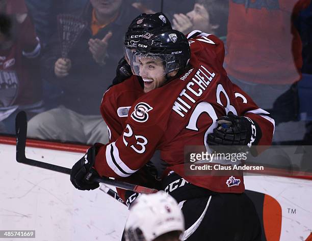 Zack Mitchell of the Guelph Storm celebrates a goal against the Erie Otters in Game Two of the OHL Western Conference Final at the Sleeman Centre on...