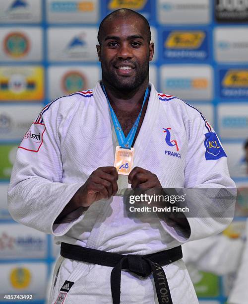 Teddy Riner of France, who has become an extraordinary legend at just 26, celebrates winning his eighth World title during the 2015 Astana World Judo...