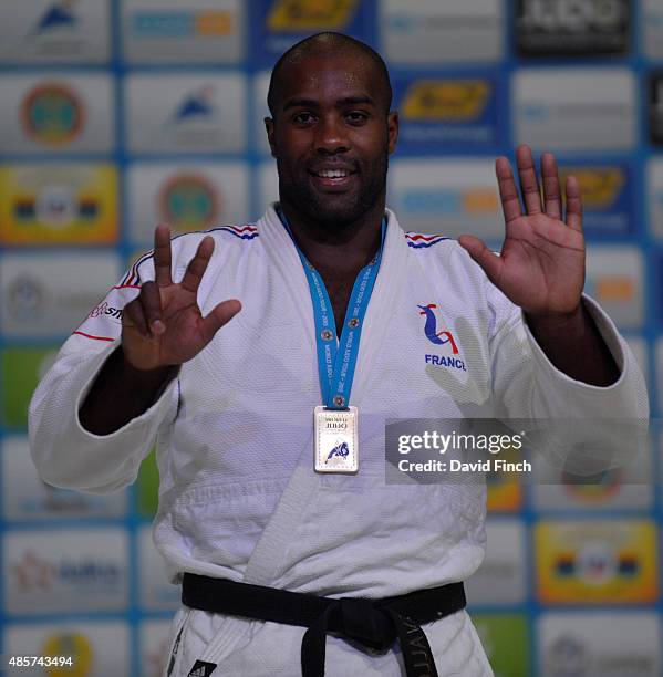 Teddy Riner of France, who has become an extraordinary legend at just 26, celebrates winning his eighth World title during the 2015 Astana World Judo...