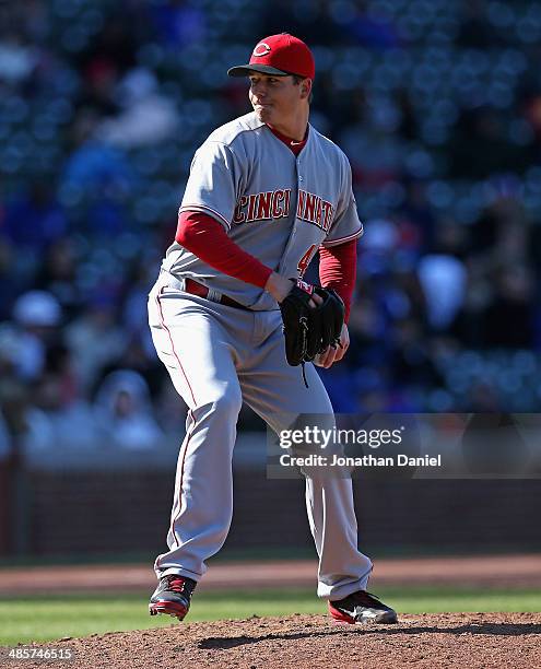Manny Parra of the Cincinnati Reds pitches against the Chicago Cubs at Wrigley Field on April 18, 2014 in Chicago, Illinois. The Reds defeated the...