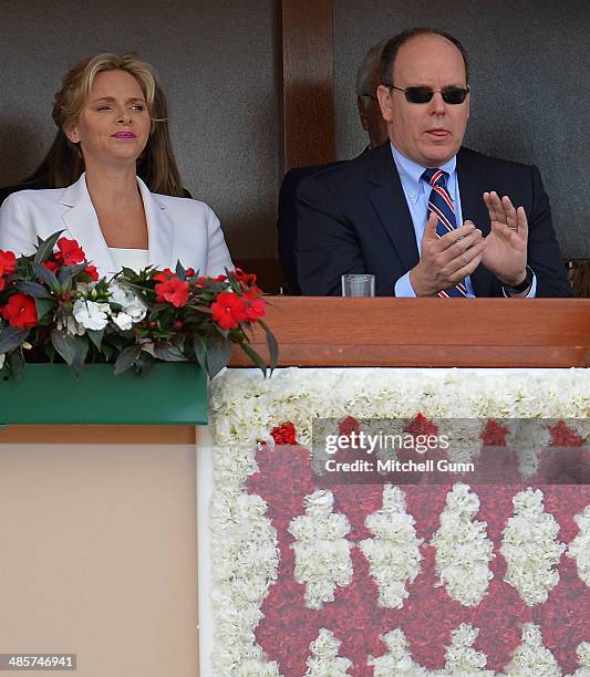 Charlene, Princess of Monaco and Albert II, Prince of Monaco watch Stanislas Wawrinka of Switzerland playing against Roger Federer of Switzerland...