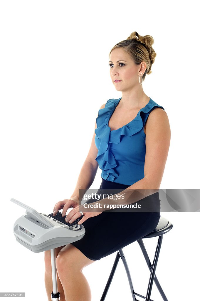 Court Reporter operating her stenotype machine