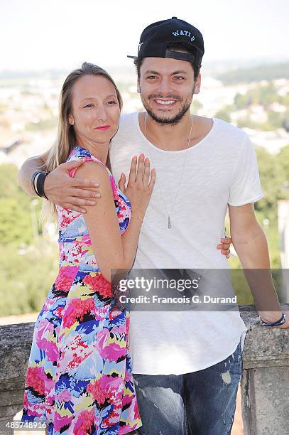 Audrey Lamy and Kev Adams attend a photocall during the 8th Angouleme French-Speaking Film Festival on August 29, 2015 in Angouleme, France.