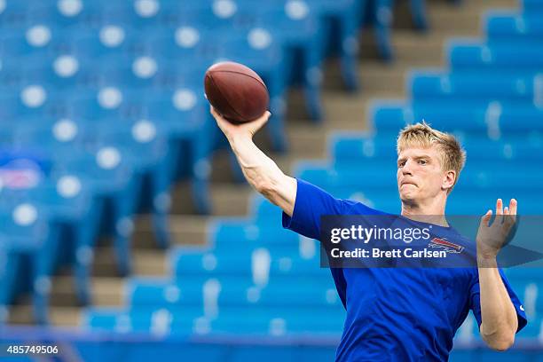 Matt Simms of the Buffalo Bills warms up before the game against the Carolina Panthers on August 14, 2015 during a preseason game at Ralph Wilson...