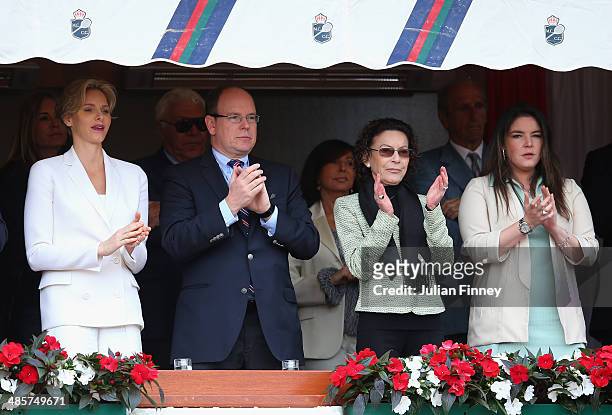 Prince Albert II, Princess Charlene, Elisabeth-Anne de Massy and Melanie-Antoinette de Massy attend the final between Roger Federer of Switzerland...