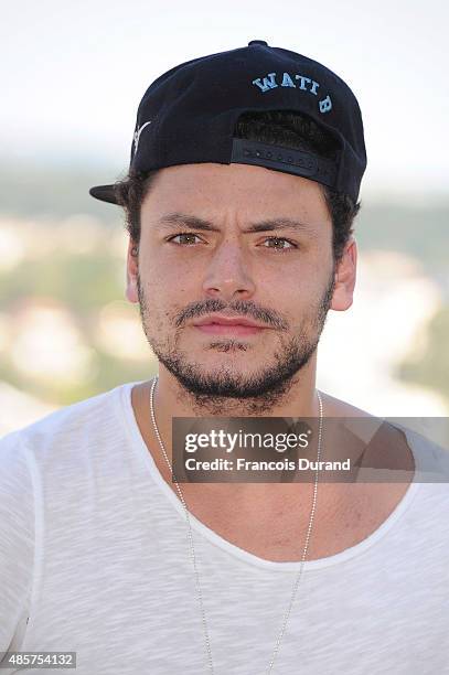 Kev Adams attends a photocall during the 8th Angouleme French-Speaking Film Festival on August 29, 2015 in Angouleme, France.