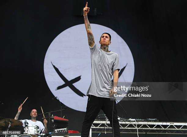 Pat Lundy and Josh Friend of Modestep perform on Day 2 of the Reading Festival at Richfield Avenue on August 29, 2015 in Reading, England.