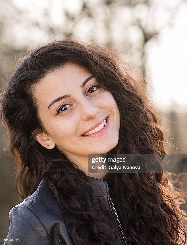 Young beautiful girl with long brown hair