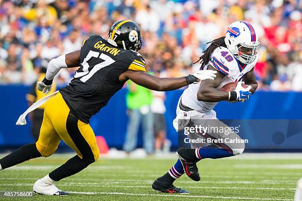 Terence Garvin of the Pittsburgh Steelers pursues as MarQueis Gray of the Buffalo Bills runs with a reception during the second half of a preseason...