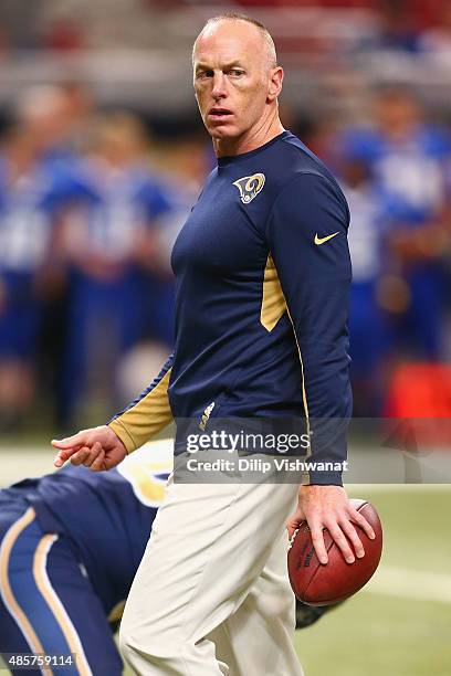 Offensive assistant Jeff Garcia looks on during warm ups prior to playing against the Indianapolis Colts in a preseason game at the Edward Jones Dome...