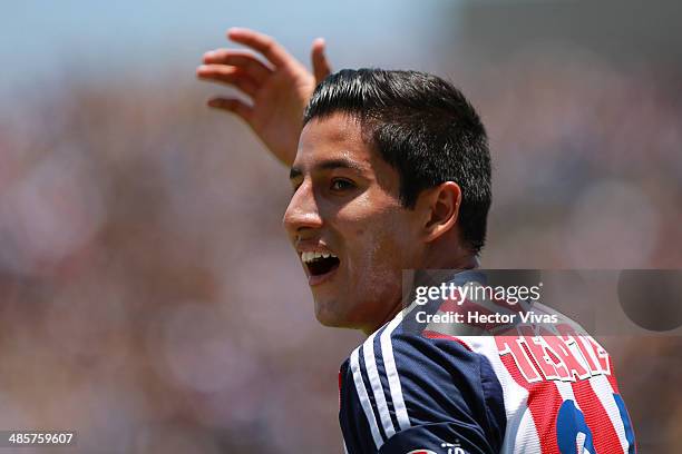 Carlos Cisneros of Chivas reacts during a match between Pumas UNAM and Chivas as part of the 16th round Clausura 2014 Liga MX at University Olympic...