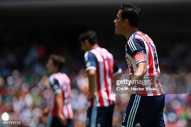 Omar Bravo of Chivas reacts during a match between Pumas UNAM and Chivas as part of the 16th round Clausura 2014 Liga MX at University Olympic...