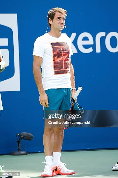 Professional tennis player Roger Federer participates during the 20th Annual Arthur Ashe Kids' Day at USTA Billie Jean King National Tennis Center on...