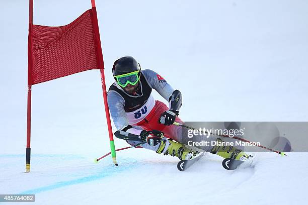 Emre Simsek of Turkey competes in the Alpine Giant Slalom - FIS Australia New Zealand Cup during the Winter Games NZ at Coronet Peak on August 30,...