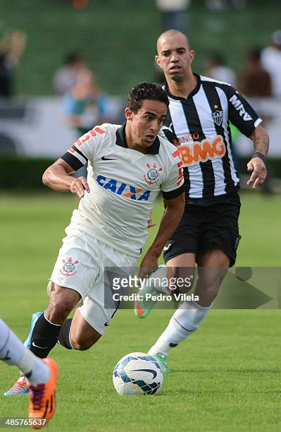 Diego Tardelli of Atletico MG and Jadson of Corinthians battle for the ball during a match between Atletico MG and Corinthians as part of Brasileirao...