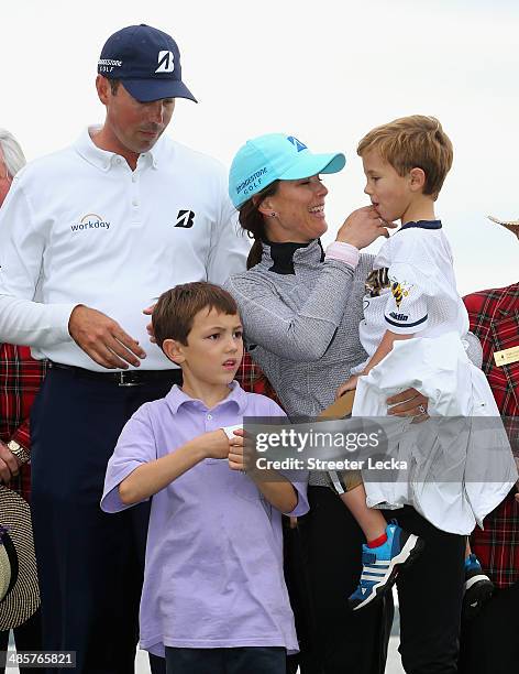 Matt Kuchar stands on the 18th green with his wife Sybi and sons Camerson and Carson after winning the RBC Heritage at Harbour Town Golf Links on...