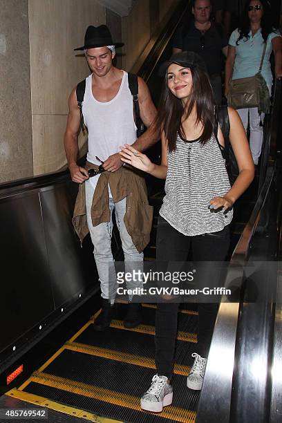 Victoria Justice and Pierson Fode are seen at LAX. On August 29, 2015 in Los Angeles, California.