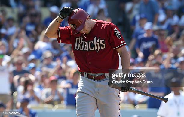 Tony Campana of the Arizona Diamondbacks reacts after striking out with runners on second and third to end the top of the seventh inning against the...