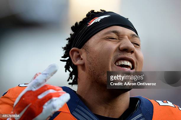 Shane Ray of the Denver Broncos sings before the first half of action at Sports Authority Field at Mile High Stadium. The Denver Broncos hosted the...