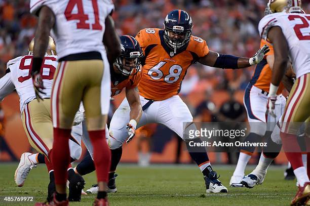 Ryan Harris of the Denver Broncos blocks for Peyton Manning agains the San Francisco 49ers during the first half of action at Sports Authority Field...