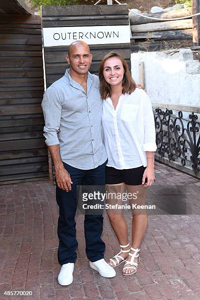 Kelly Slater and Taylor Slater attend Kelly Slater, John Moore and Friends Celebrate the Launch of Outerknown at Private Residence on August 29, 2015...