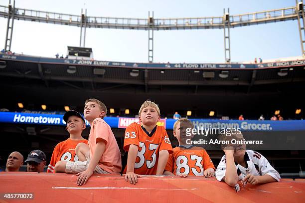 From left to right Hayes Gatlin, Taylor Hays, Elias Schendler, Maverik Domprowski, and William Daniel await the action between the Denver Broncos and...