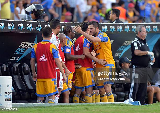 Andre-Pierre Gignac of Tigres celebrates after scoring the third goal of his team during a 7th round match between Tigres UANL and Queretaro as part...