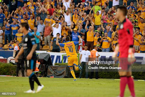 Andre-Pierre Gignac of Tigres celebrates after scoring his team's third goal during a 7th round match between Tigres UANL and Queretaro as part of...