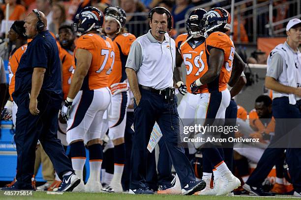 Head coach Gary Kubiak of the Denver Broncos walks the sidelines against the San Francisco 49ers during the first half of action at Sports Authority...