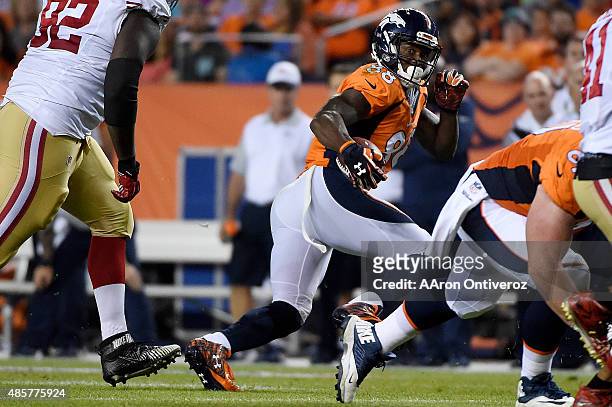 Demaryius Thomas of the Denver Broncos makes a catch and run against the San Francisco 49ers during the first half of action at Sports Authority...