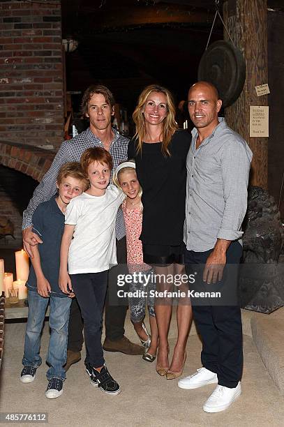 Daniel Moder, Julia Roberts, Kelly Slater, Phinnaeus Moder, Henry Daniel Moder and Hazel Moder attend Kelly Slater, John Moore and Friends Celebrate...