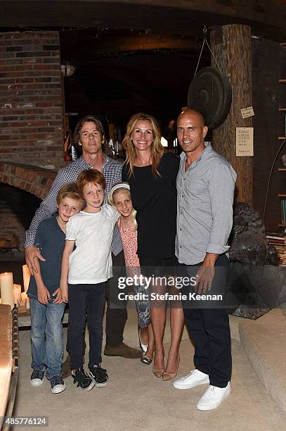 Daniel Moder, Julia Roberts, Kelly Slater, Phinnaeus Moder, Henry Daniel Moder and Hazel Moder attend Kelly Slater, John Moore and Friends Celebrate...