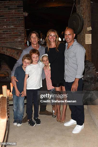 Daniel Moder, Julia Roberts, Kelly Slater, Phinnaeus Moder, Henry Daniel Moder and Hazel Moder attend Kelly Slater, John Moore and Friends Celebrate...