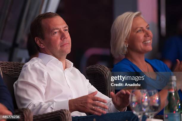 Russian super middleweight boxing champion Natalia Ragozina and Russia's Prime Minister Dmitry Medvedev attend the Plotforma S-70 international...