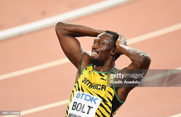 Usain Bolt of Jamaica celebrates after wining gold in the Men's 4x100 Metres Relay final during the '15th IAAF World Athletics Championships Beijing...