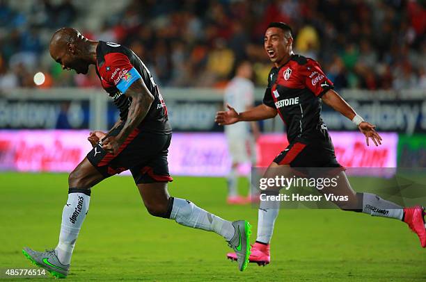 Felipe Baloy of Atlas celebrates after scoring the first goal of his team during a 7th round match between Pachuca and Atlas as part of the Apertura...