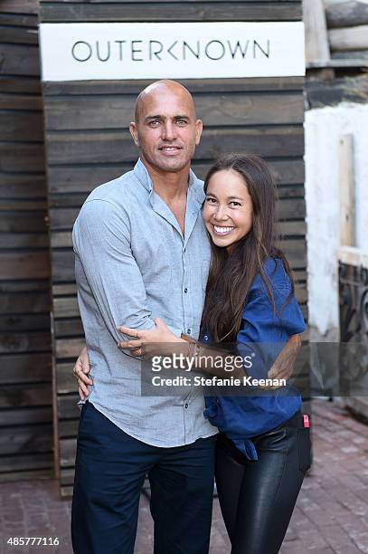 Kelly Slater and Kalani Miller attend Kelly Slater, John Moore and Friends Celebrate the Launch of Outerknown at Private Residence on August 29, 2015...