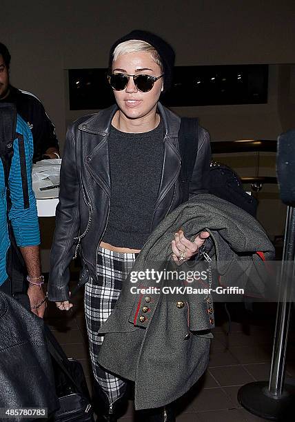 Miley Cyrus is seen at Los Angeles International Airport on February 15, 2013 in Los Angeles, California.