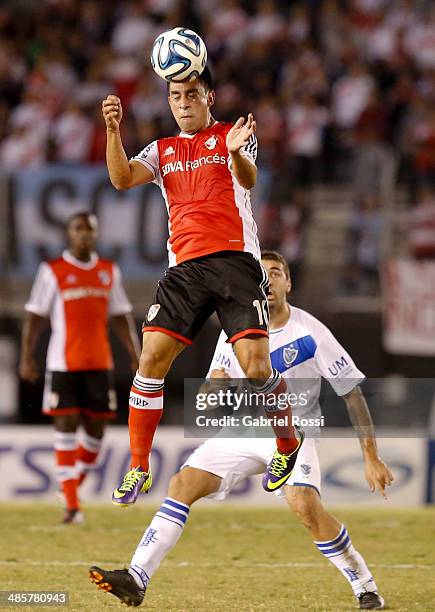 Ariel Rojas of River Plate heads the ball during a match between River Plate and Velez Sarsfield as part of 15th round of Torneo Final 2014 at...