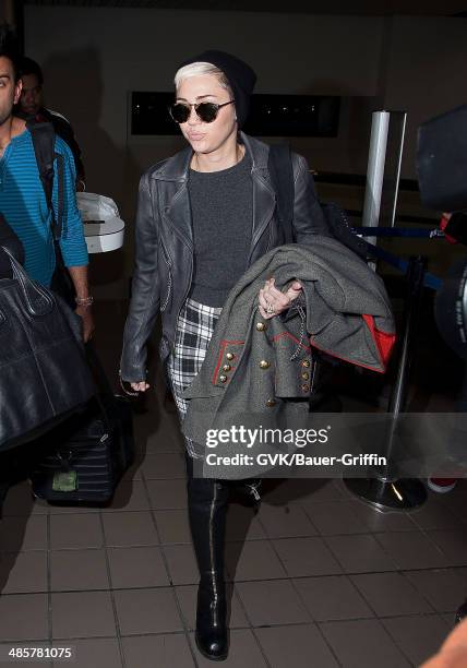 Miley Cyrus is seen at Los Angeles International Airport on February 15, 2013 in Los Angeles, California.