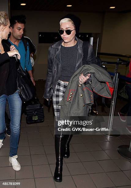 Miley Cyrus is seen at Los Angeles International Airport on February 15, 2013 in Los Angeles, California.