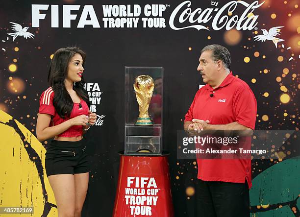 Nabila Tapia and Fernando Fiore pose during the FIFA World Cup Trophy Tour during the Nuestra Belleza Latina taping at Univision Headquarters on...